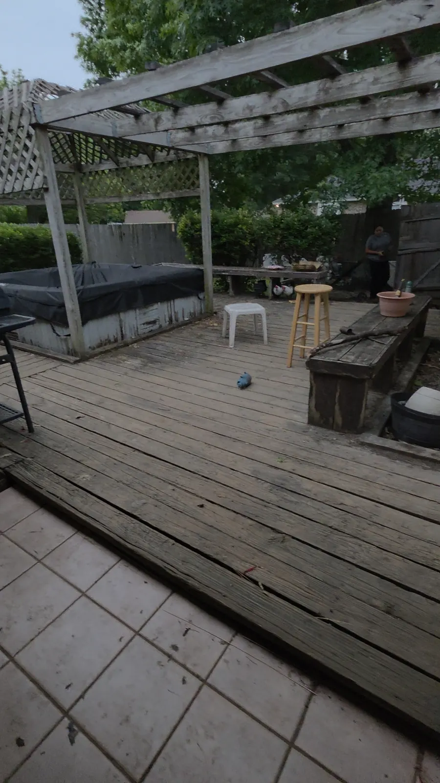 Old wooden deck and pergola before demolition and removal