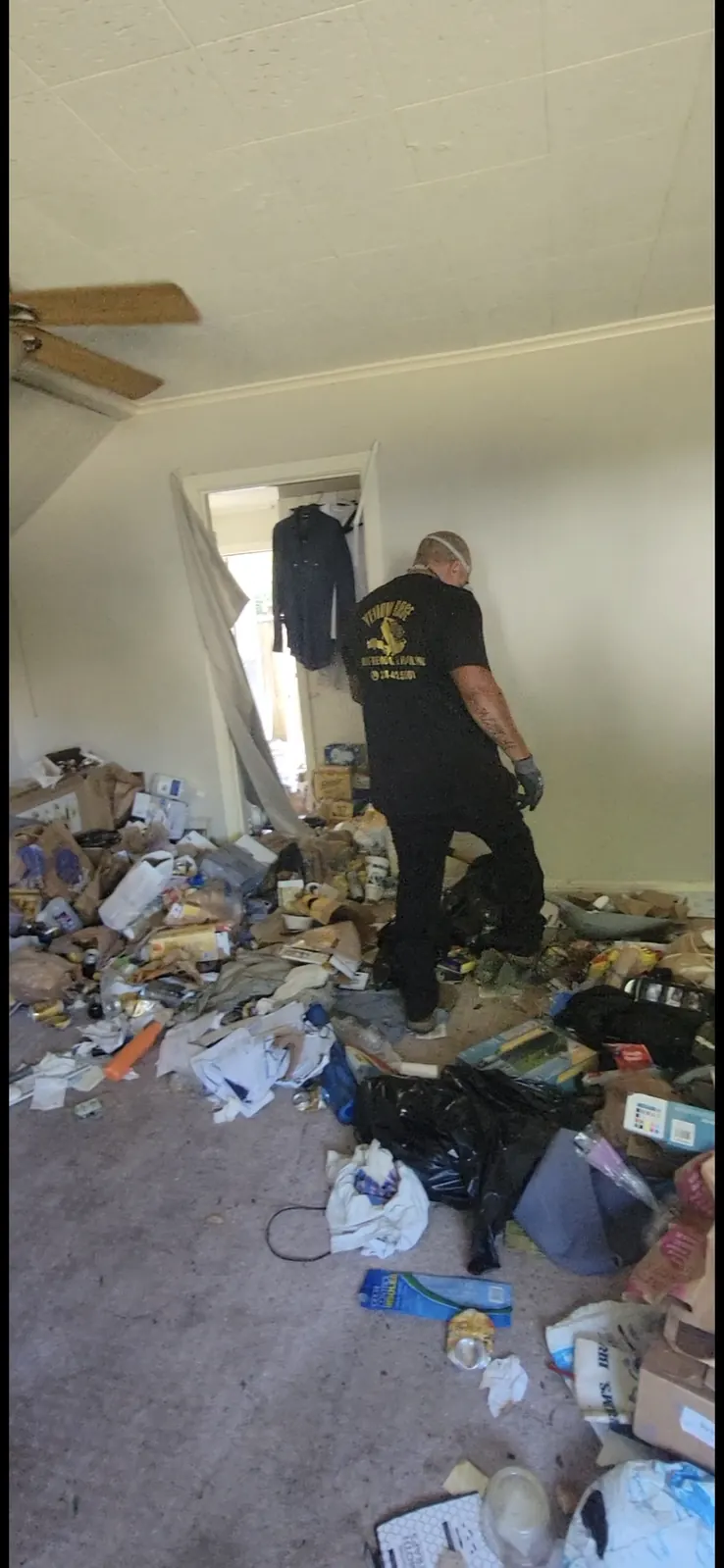 Yellow Rose crew working through a hoarding cleanup