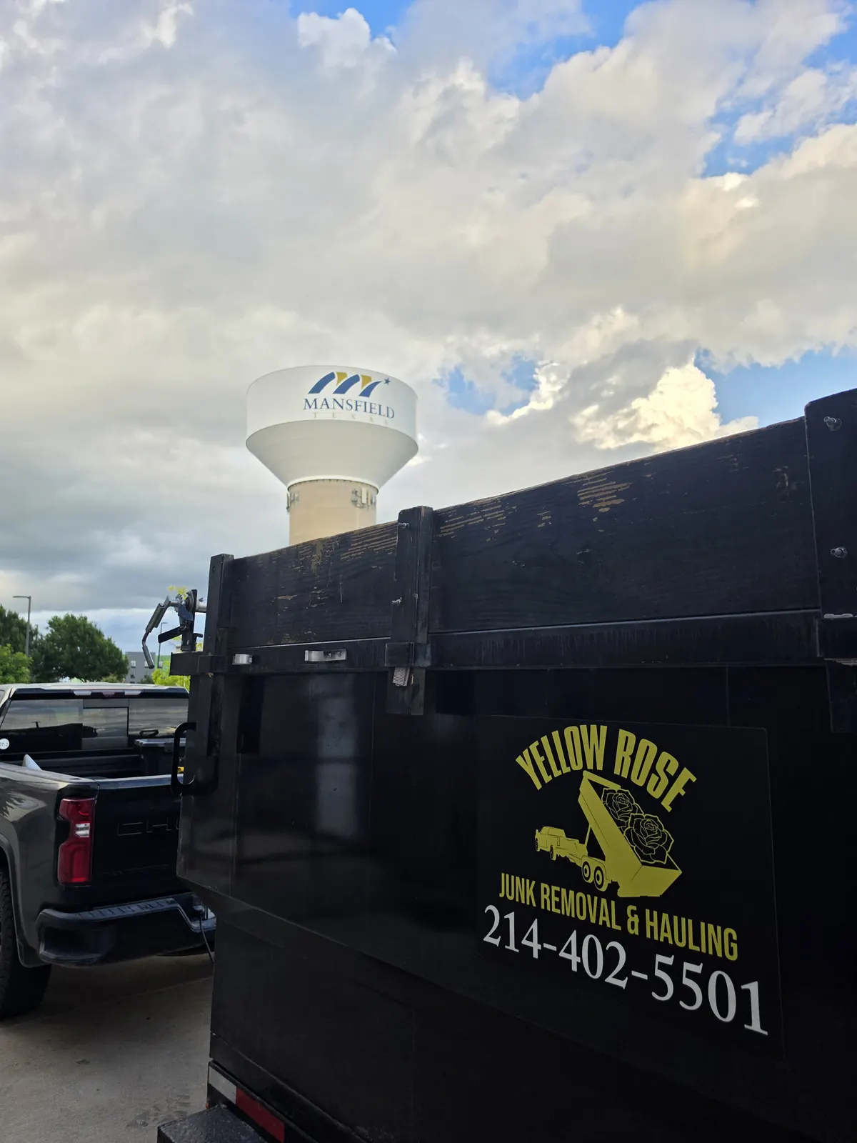 Yellow Rose trailer on a job in Mansfield by the water tower
