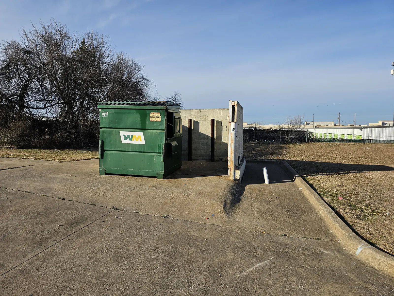 Dumpster area clear after sofa removal