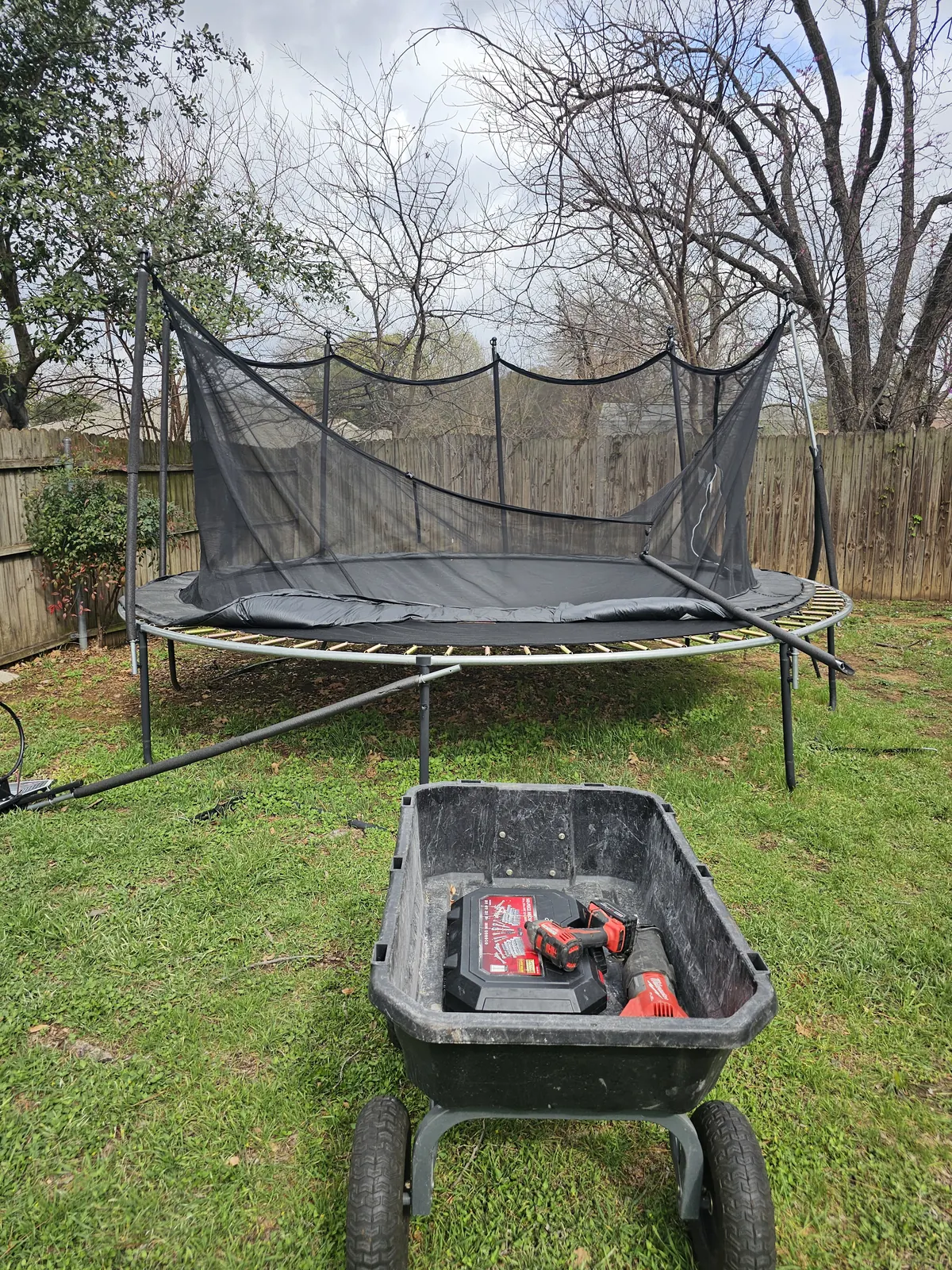 Backyard trampoline before teardown and removal