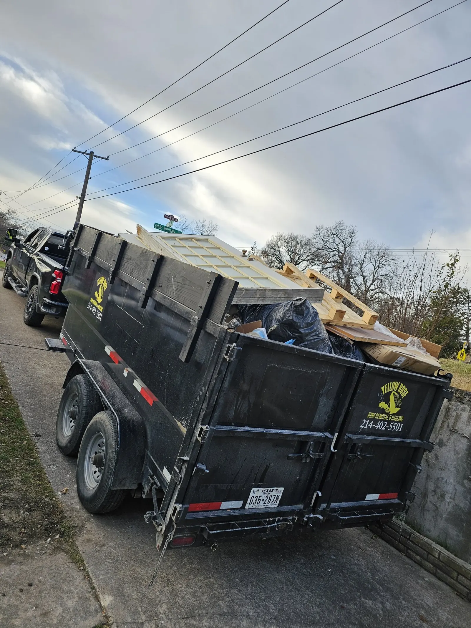 Yellow Rose Junk Removal team and truck